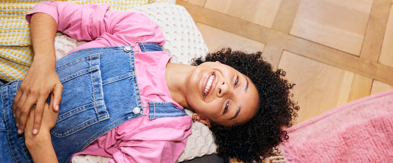 Young woman on a cushion