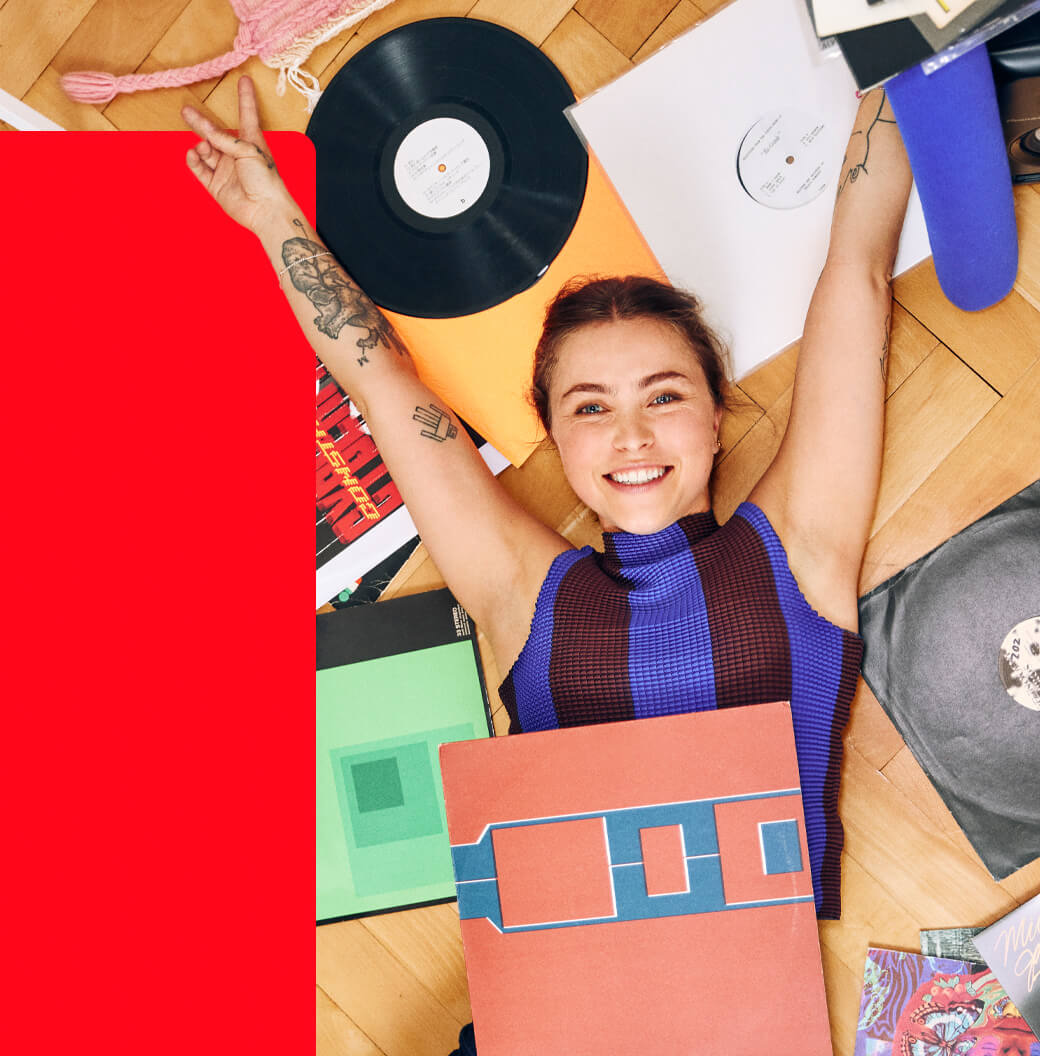 Young woman with vinyl records