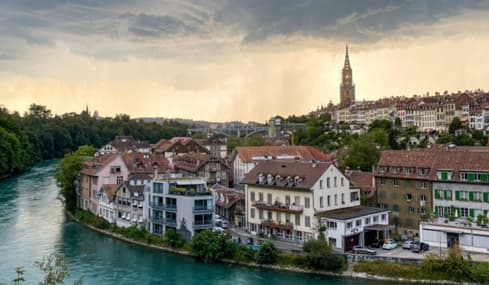 View of the City of Bern with the Aare River, buildings and the Cathedral tower