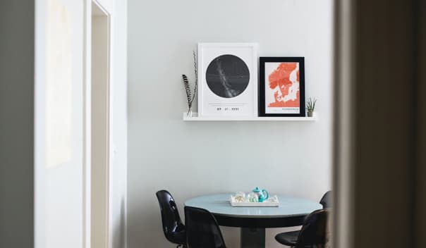 Room apartment with table and wall shelf